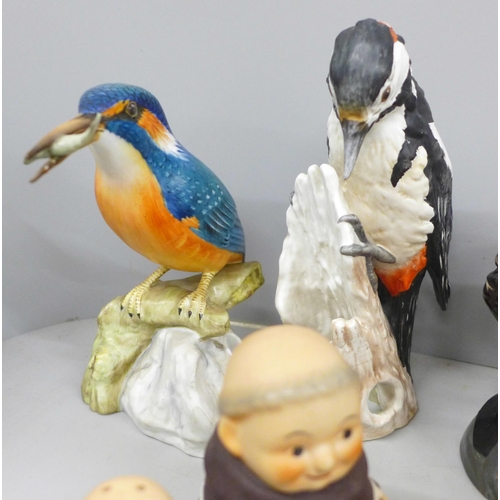 2083 - A Goebel model woodpecker, a Spode kingfisher, Goebel monk cruets and two Royal Doulton character mu... 