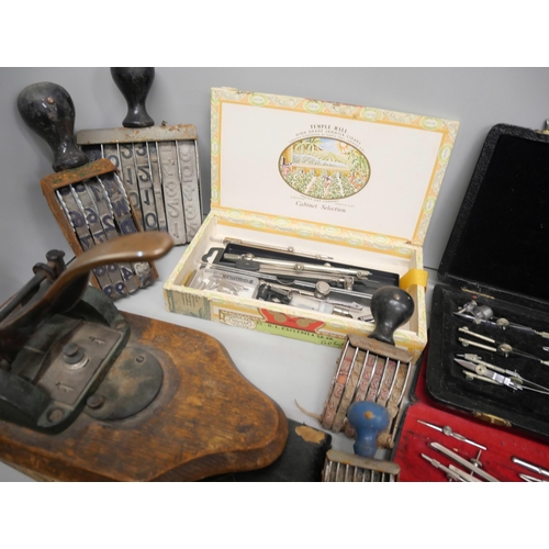 2110 - A Rexel Speedguide Edge Binder, two ink rollers, a collection of desk stamps, Stolzenberg hole punch... 