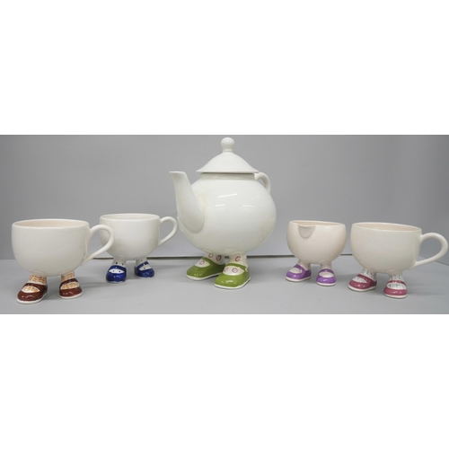 2115 - A collection of Carlton ‘walking’ ware items, includes teapot, egg cups and cups, etc.