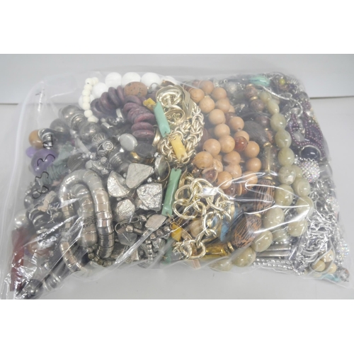 2133 - A large collection of costume jewellery to include bangles and necklaces