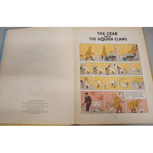 2145 - A collection of books to include Hergé's The Adventures of Tintin: The Crab with The Golden Claws pu... 