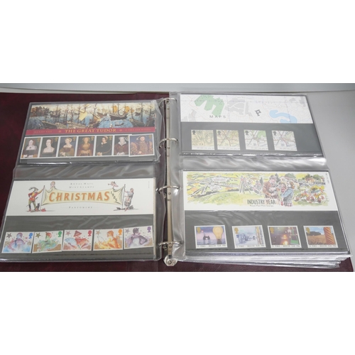 2146 - Stamps; An album of British Royal Mail presentation packs forty-eight in total. Examples include Bri... 