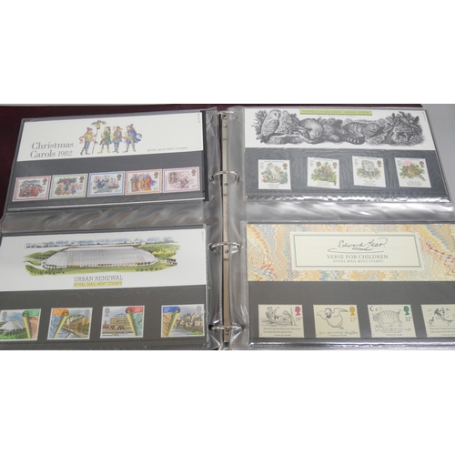 2146 - Stamps; An album of British Royal Mail presentation packs forty-eight in total. Examples include Bri... 