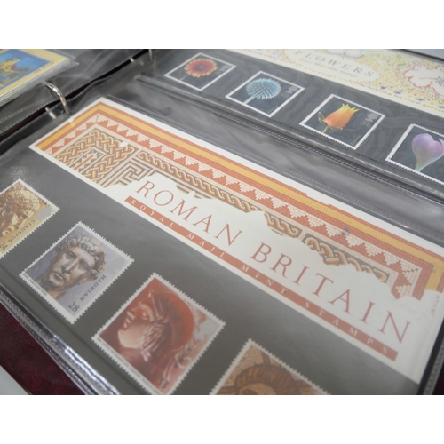 2146 - Stamps; An album of British Royal Mail presentation packs forty-eight in total. Examples include Bri... 