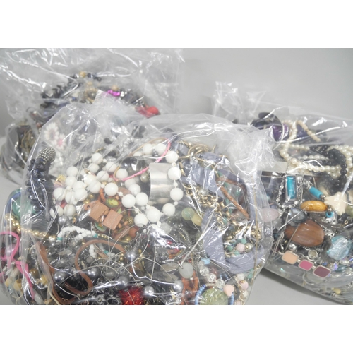 2160 - A large collection of costume jewellery, (3 bags)