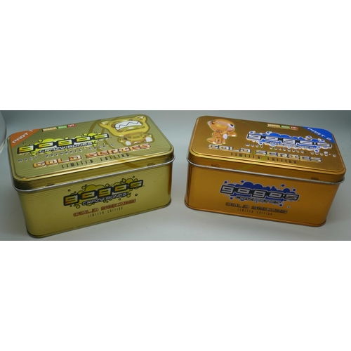 2183 - Two collectors limited edition ‘gogo’s’ Crazy Bones Gold Edition part 1 and part 2, two tins of 10