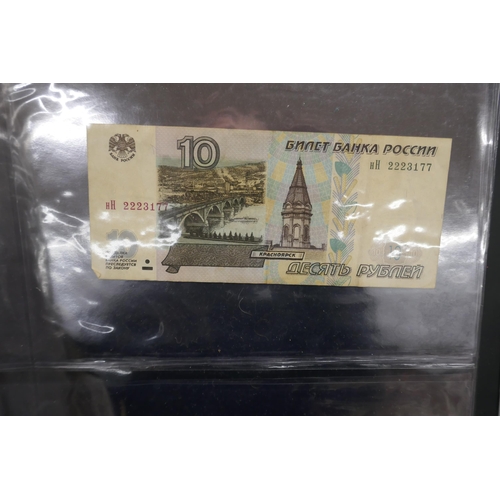 2195 - Sixteen bank notes, includes Australia, Hong Kong, Japan, Zimbabwe and Iraq, etc.