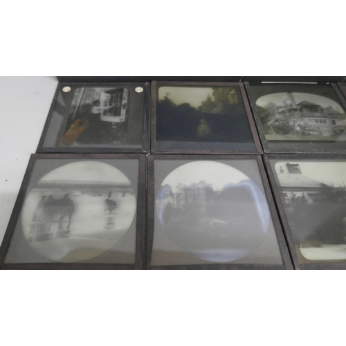 2204 - A box of 44 Victorian and Edwardian lantern slides, includes beach scenes, street scenes, motor car ... 