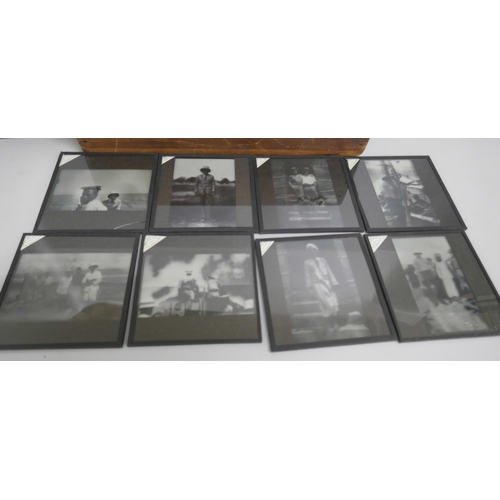 2205 - A box of 74 Edwardian lantern slides including bi-planes, tiger kill, Indian military life, mountain... 