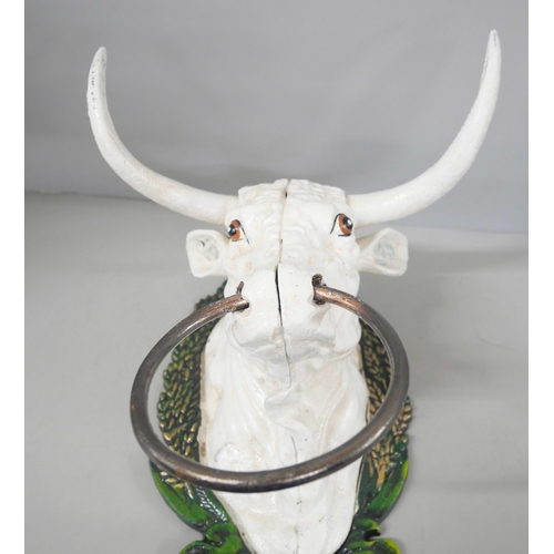 2214 - A wall mounted metal bull head with large ring in nose