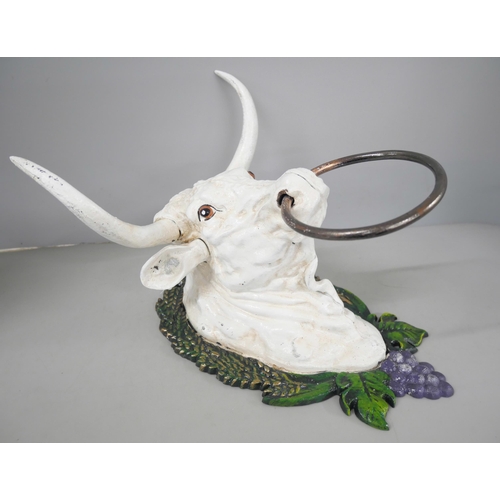 2214 - A wall mounted metal bull head with large ring in nose