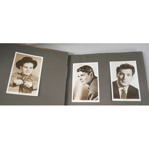 2218 - A collection of film memorabilia, includes photograph album with many film stars, Errol Flynn, Tony ... 