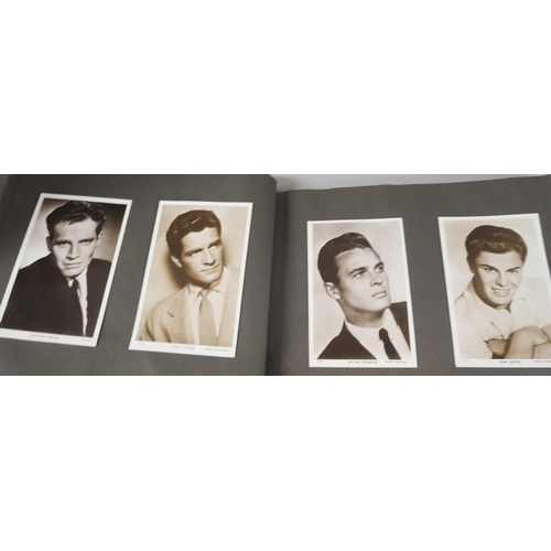 2218 - A collection of film memorabilia, includes photograph album with many film stars, Errol Flynn, Tony ... 