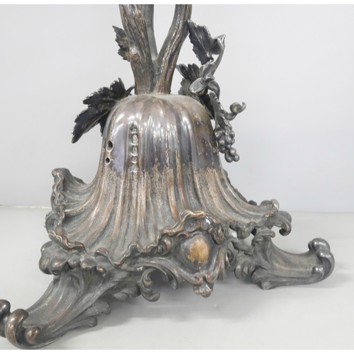 2221 - A large Elkington & Co. silver plate on copper centrepiece adorned with grape detail and acanthus st... 