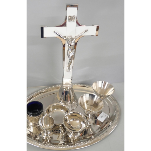 2230 - A silver plated Communion set comprising of crucifix, tray, and various small bowls