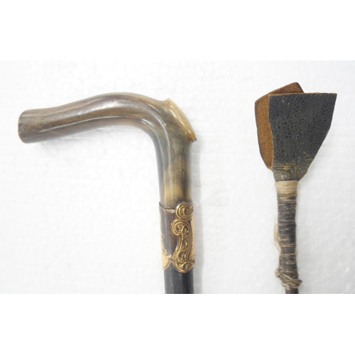 2233 - Collection of items to include a riding crop, horn handled walking stick with gold plated collar and... 