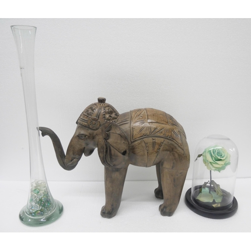 2260 - A collection of assorted items to include large model carved wooden elephant, a Forever Rose in glas... 