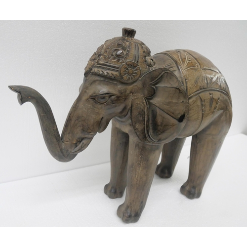 2260 - A collection of assorted items to include large model carved wooden elephant, a Forever Rose in glas... 