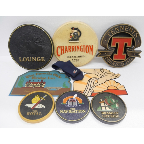 2269 - A collection of metal and resin signs including breweries and associated tie, a set of kitchen scale... 