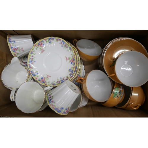 2271 - A box containing three tea sets including bone china Westbury Radfords Fenton having six teacups and... 