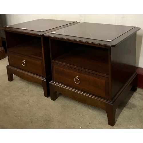 213 - A pair of Stag Minstrel mahogany bedside tables