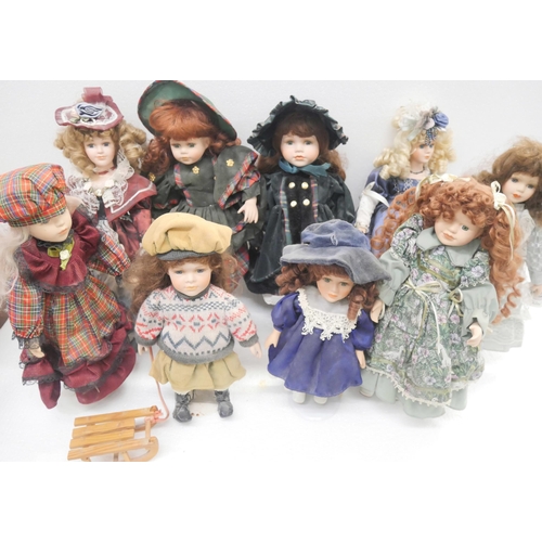 2276 - A collection of nine porcelain dolls *THIS LOT IS NOT AVAILABLE FOR PACKING AND POSTING*