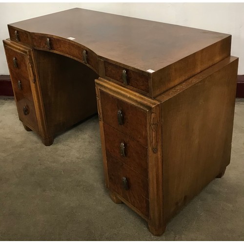 214 - An Art Deco burr walnut desk