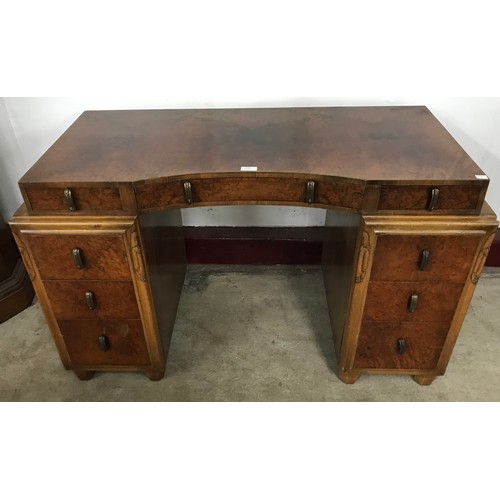 214 - An Art Deco burr walnut desk