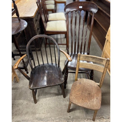 230 - A Victorian elm and beech rocking chair, a child's beech chair and an Ercol chair