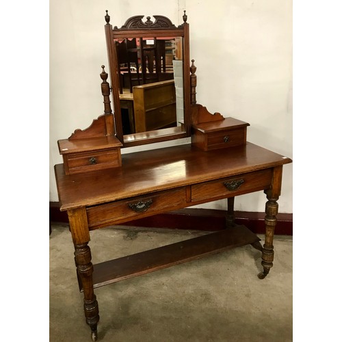 219 - A Victorian walnut dressing table