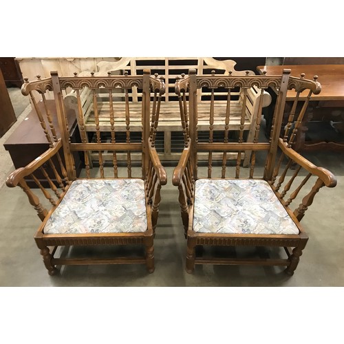 263 - A pair of Ercol Old Colonial ash armchairs