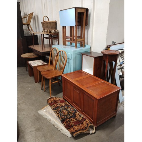 282 - An early 20th Century painted pine dresser, an oak draw leaf table, mahogany sideboard, blanket box,... 