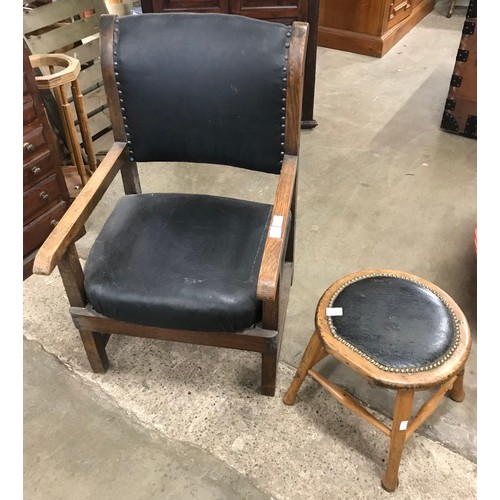 265 - An Arts & Crafts oak fireside chair and an a elm footstool