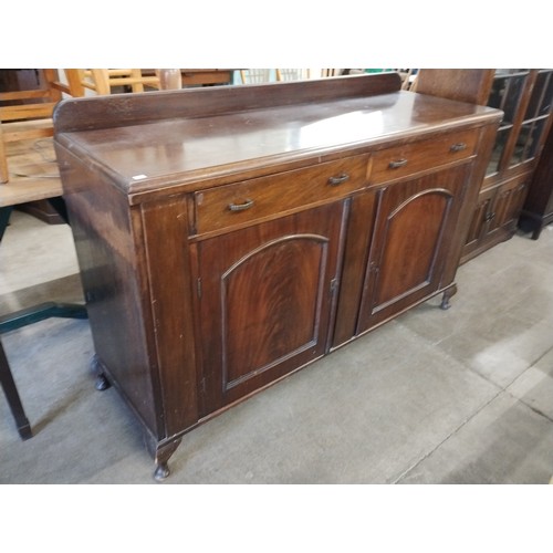 282 - An early 20th Century painted pine dresser, an oak draw leaf table, mahogany sideboard, blanket box,... 