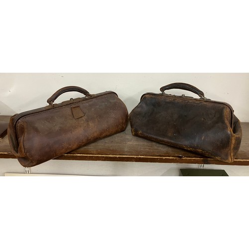 335 - Two vintage leather Gladstone bags