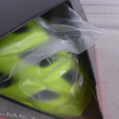 5202 - A box of 10 Balstra fluorescent unused bike helmets