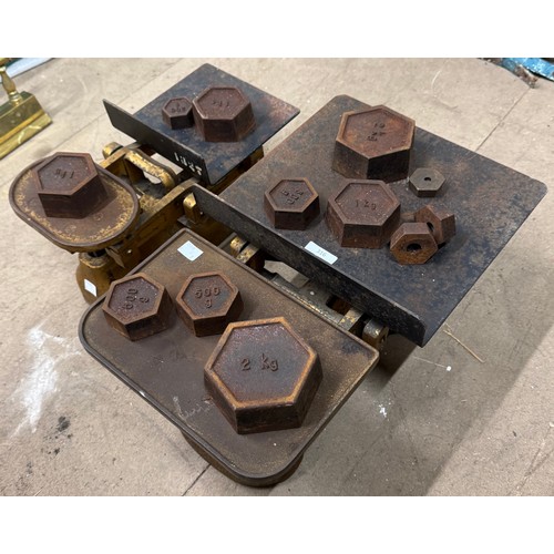 316 - Two sets of metal scales and weights