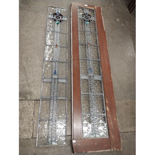 302 - A pair of Art Nouveau stained glass window panes