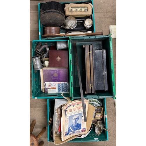 319 - Four boxes of assorted metalware, war magazines, vintage radio, etc.