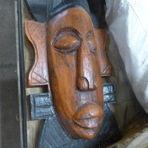 5245 - A quantity of carved wood and other decorative items including tribal masks, tribal wooden carved CD... 