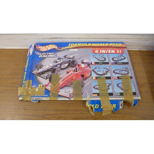 5247 - A large quantity of slot racing games including Scalextric Jaguar Challenge, Scalextric Continental ... 