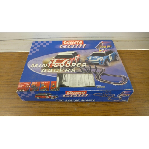 5247 - A large quantity of slot racing games including Scalextric Jaguar Challenge, Scalextric Continental ... 