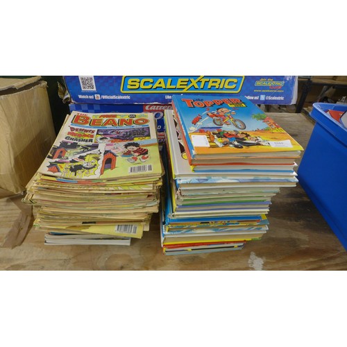 5268 - A large quantity of vintage annuals and comics including The Beano, The Dandy, The Topper, Whizzer a... 