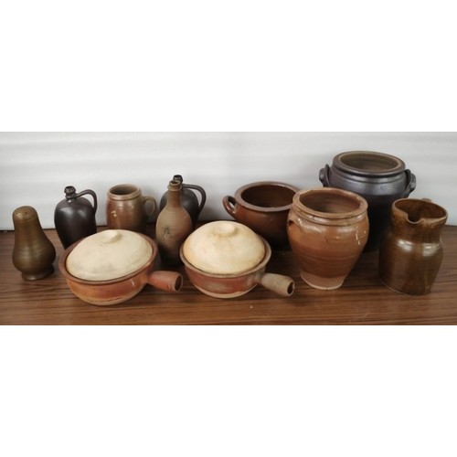 307 - Assorted terracotta and clay pots and urns