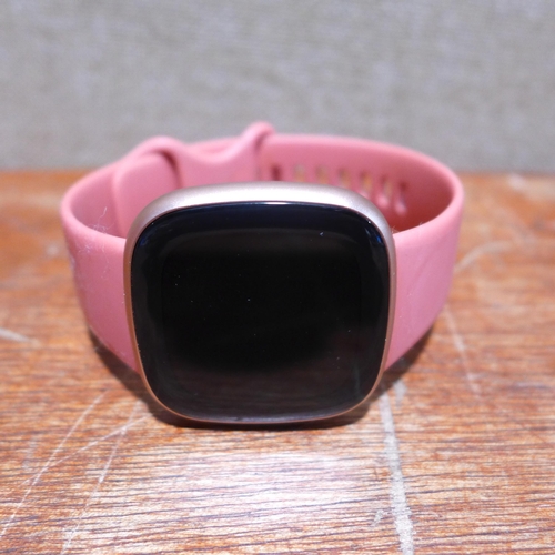 6115 - Fitbit Versa 4 with Pink wristband, Original RRP £144.99 + VAT (352-70) *This lot is subject to VAT