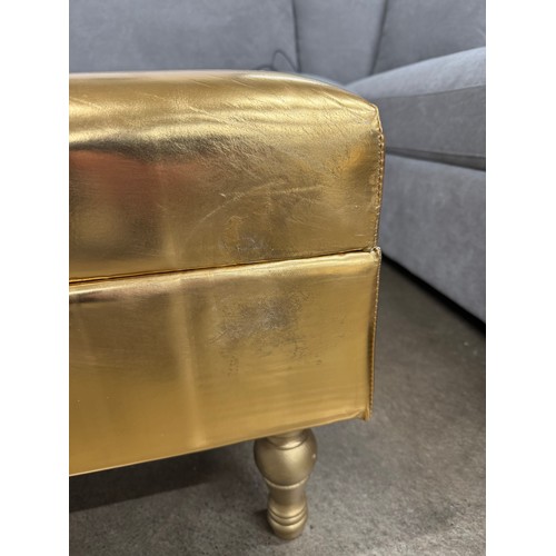 3010 - A gold ottoman footstool - (Marked)