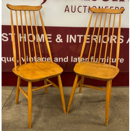 16 - A pair of Ercol style elm and beech side chairs