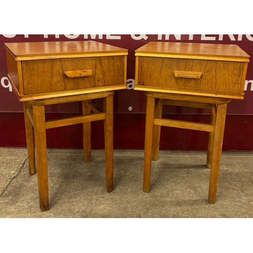 18 - A pair of teak single drawer bedside tables