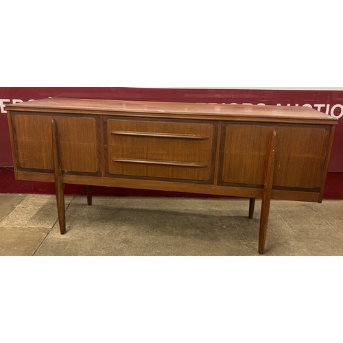 21 - A teak sideboard