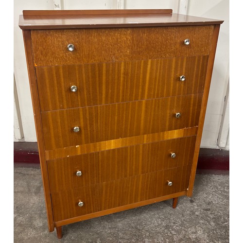 22 - A teak chest of drawers